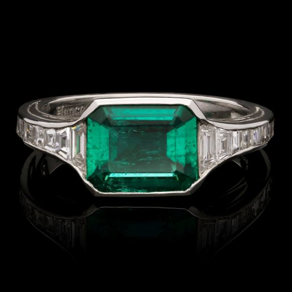 1.51ct Colombian Emerald Ring set Across the Finger with Diamond Shoulders