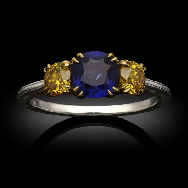 1.02ct Sapphire and 0.66ct Fancy Vivid Diamond Three Stone Ring