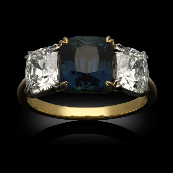 3.30ct Teal Sapphire and 2.19ct Old Mine Cushion Cut Diamond Three Stone Ring