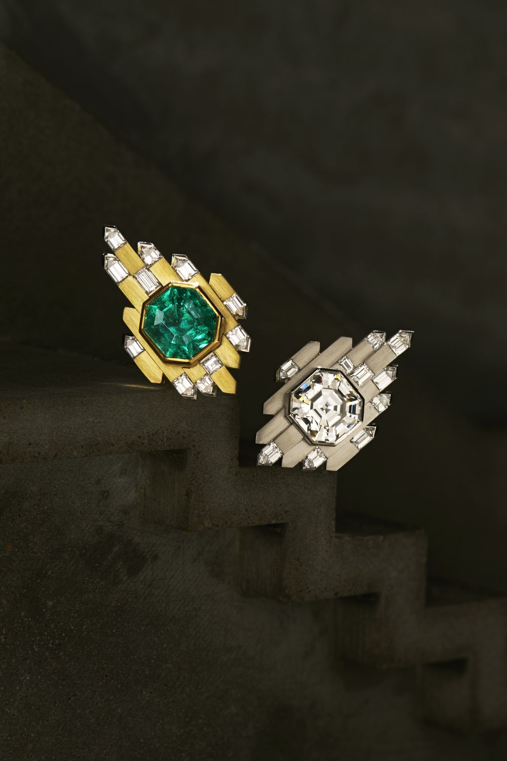 The earrings photographed on stone