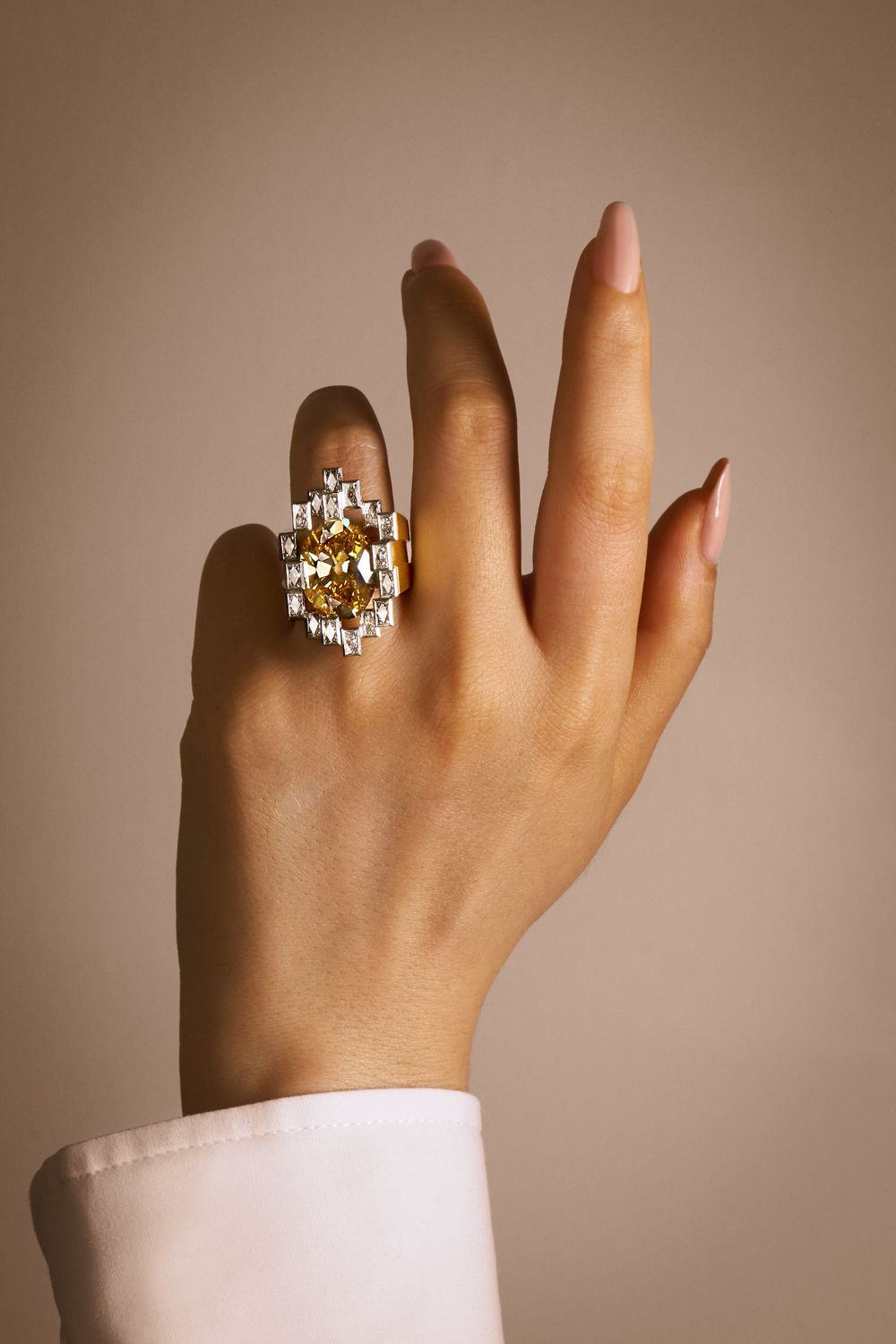 The cognac diamond ring, worn